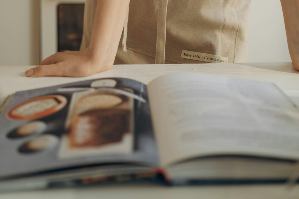 Reading cooking recipe book before cooking anything